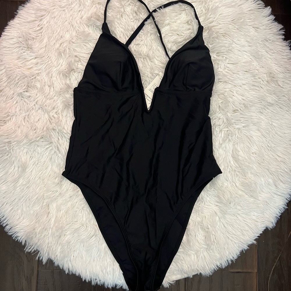 New woman’s Black Strappy Swimsuit